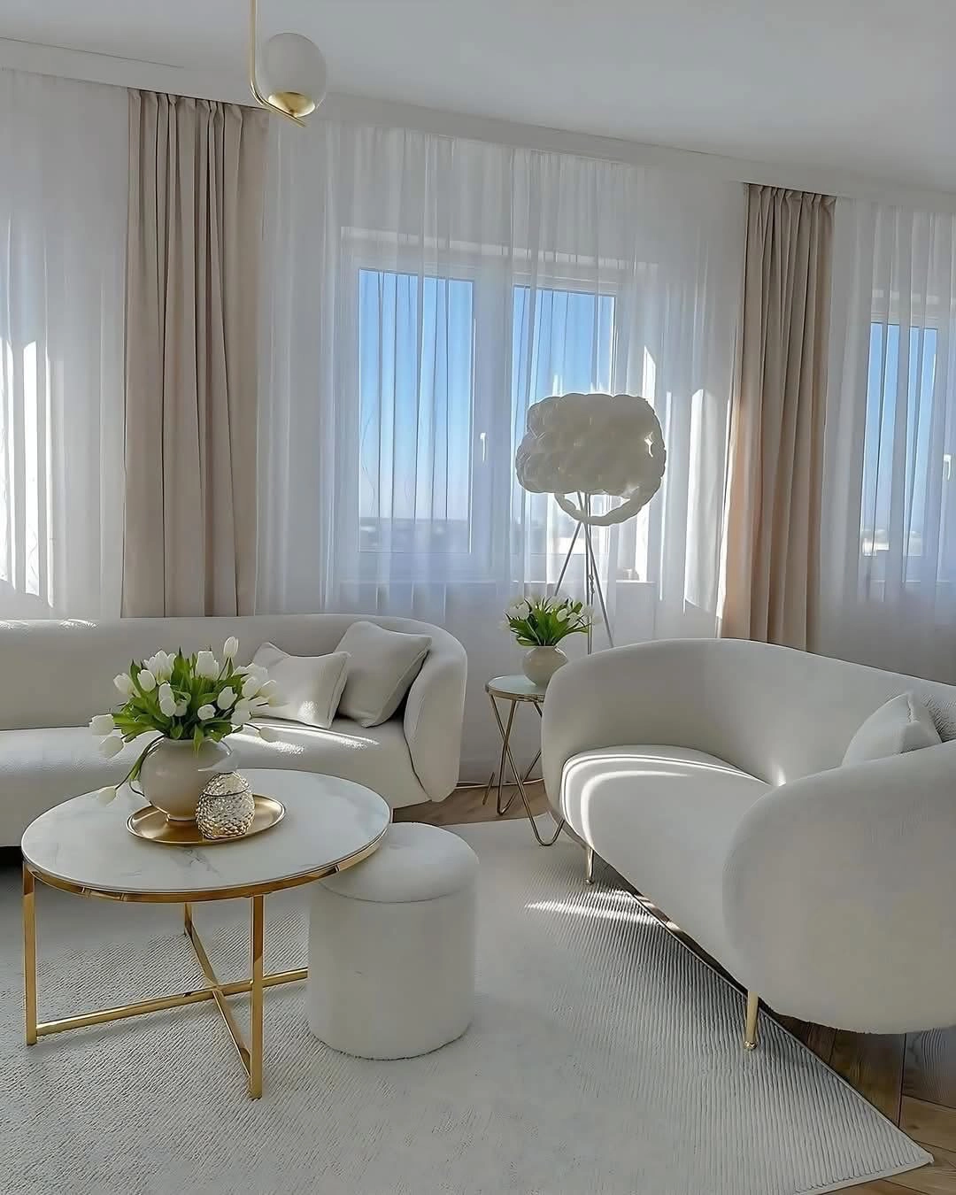 Spacious renovated living room with hardwood floors